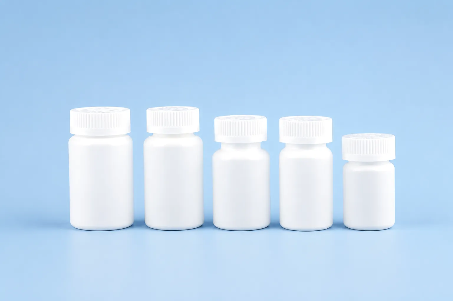 IBM machine producing oral solid pharmaceutical drug bottles