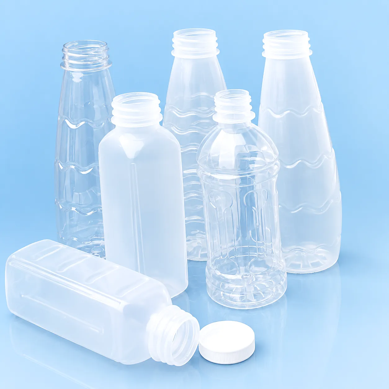 Injection blow molding machine producing hot-fill juice bottles